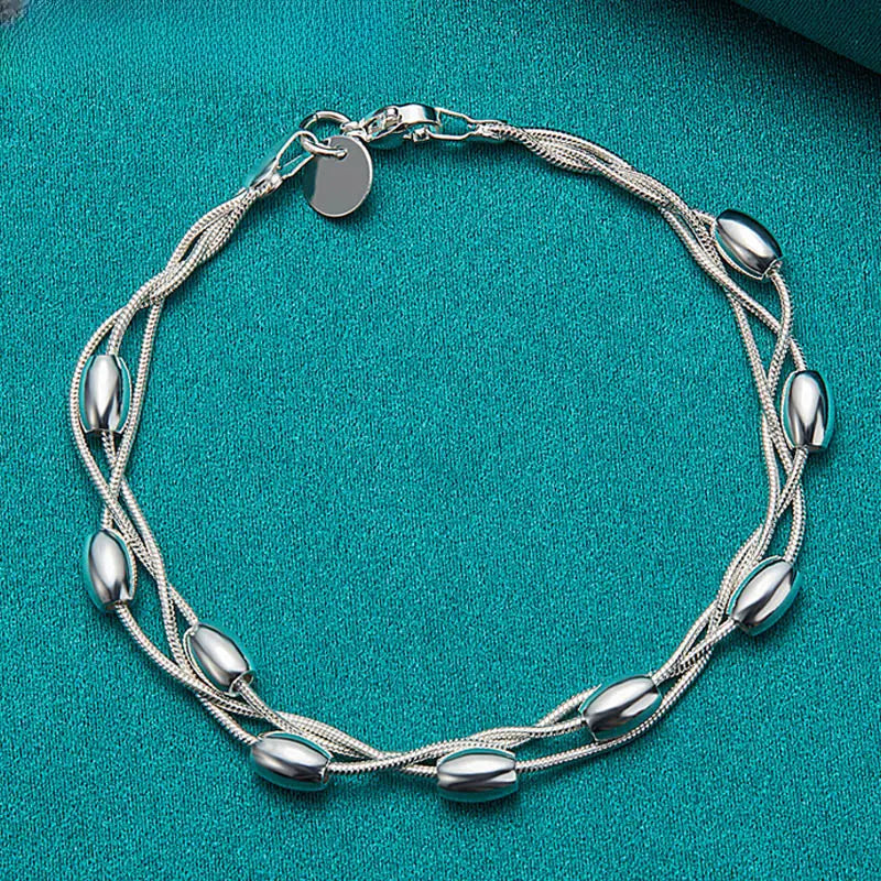 Pulsera de cadena fina multicapa